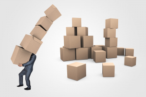 Man carrying load of hard copy record storage boxes after imaging project is completed